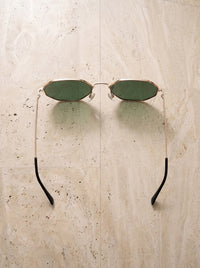 Dourado com lente verde