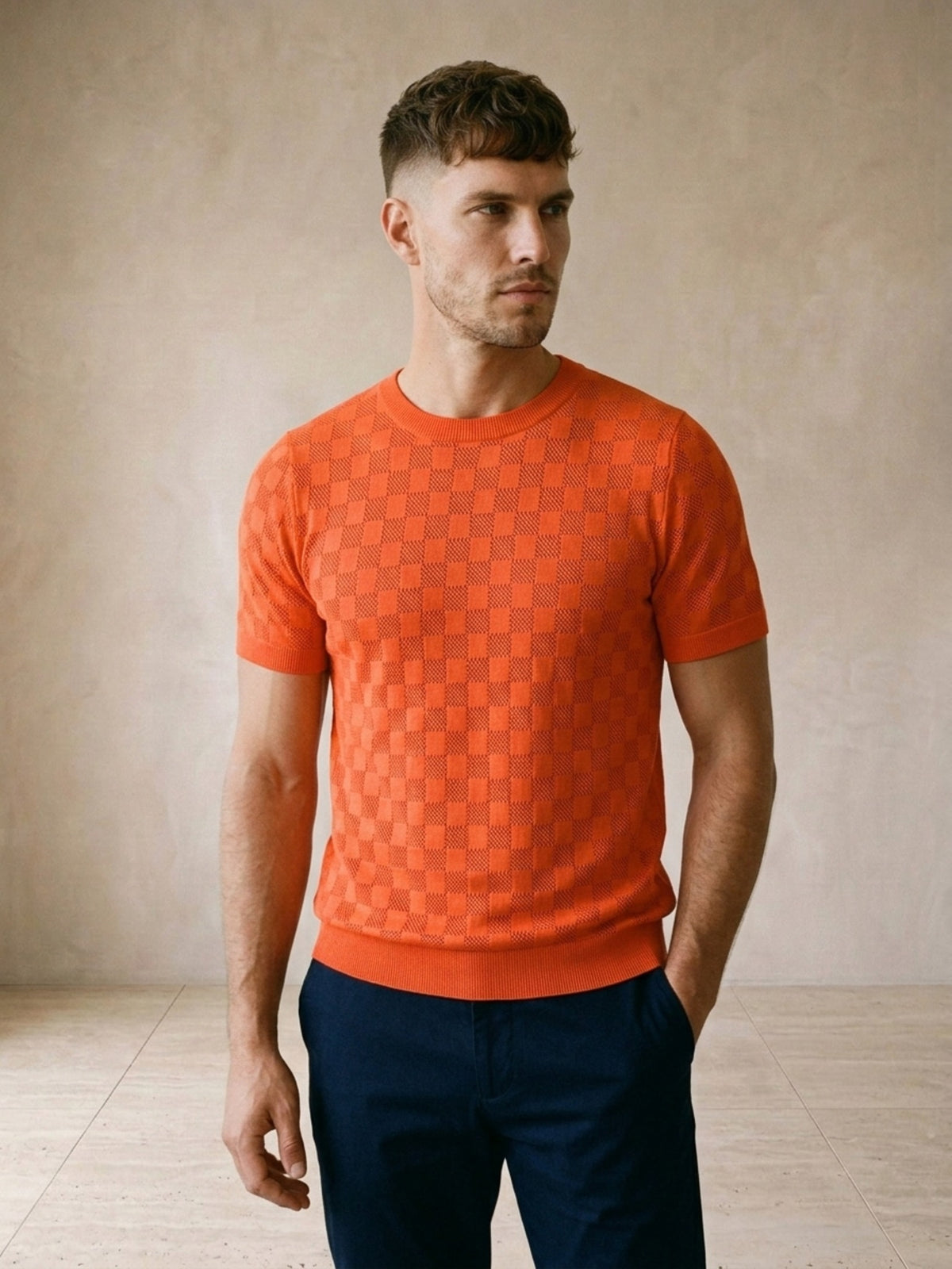 Laranja | Camiseta de tricô Sartong Svolvær laranja – vista de frente, recorte próximo