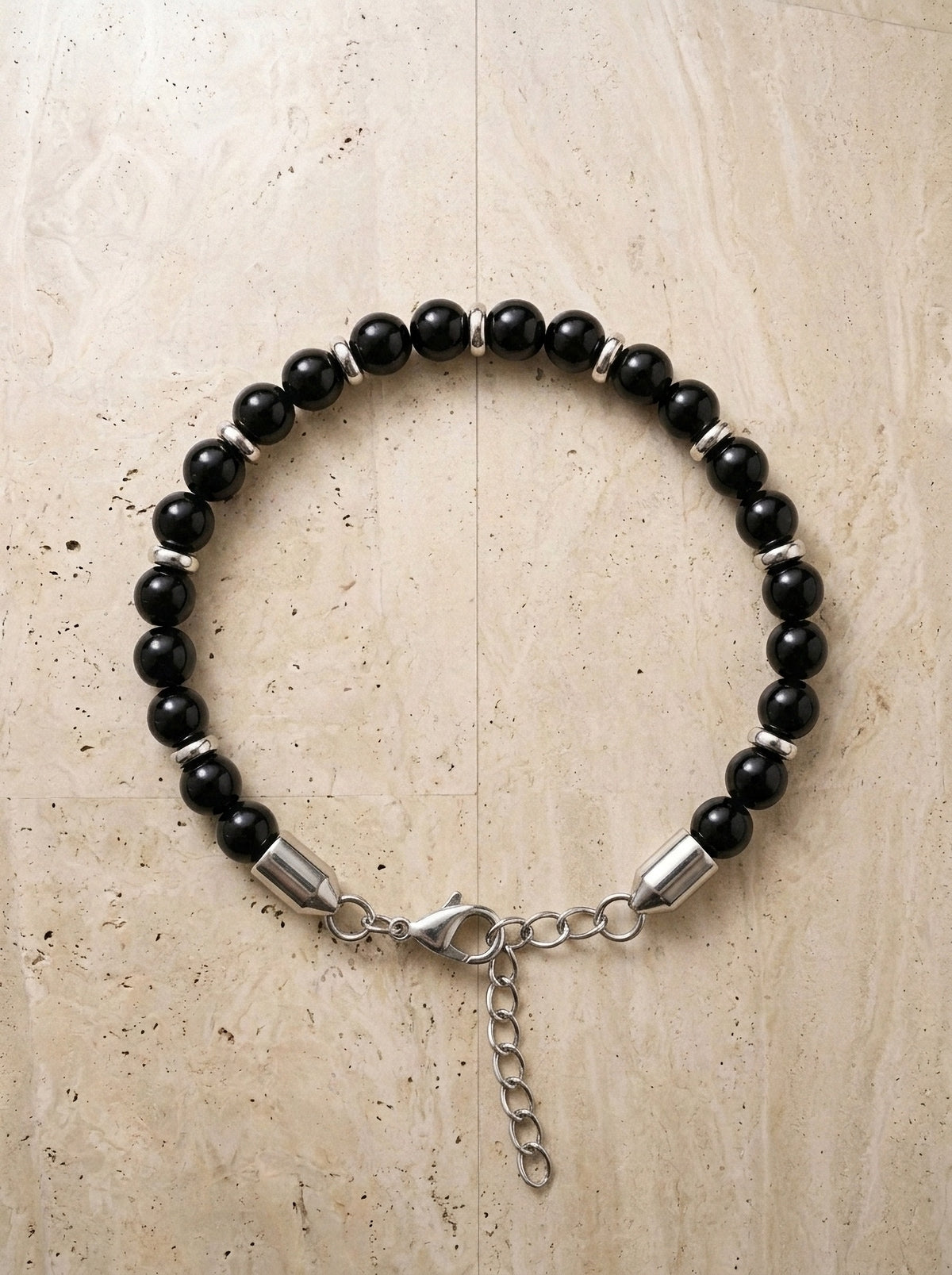 Preto brilhoso | Pulseira de pedras Valença preto brilhoso – peça sozinha vista de cima